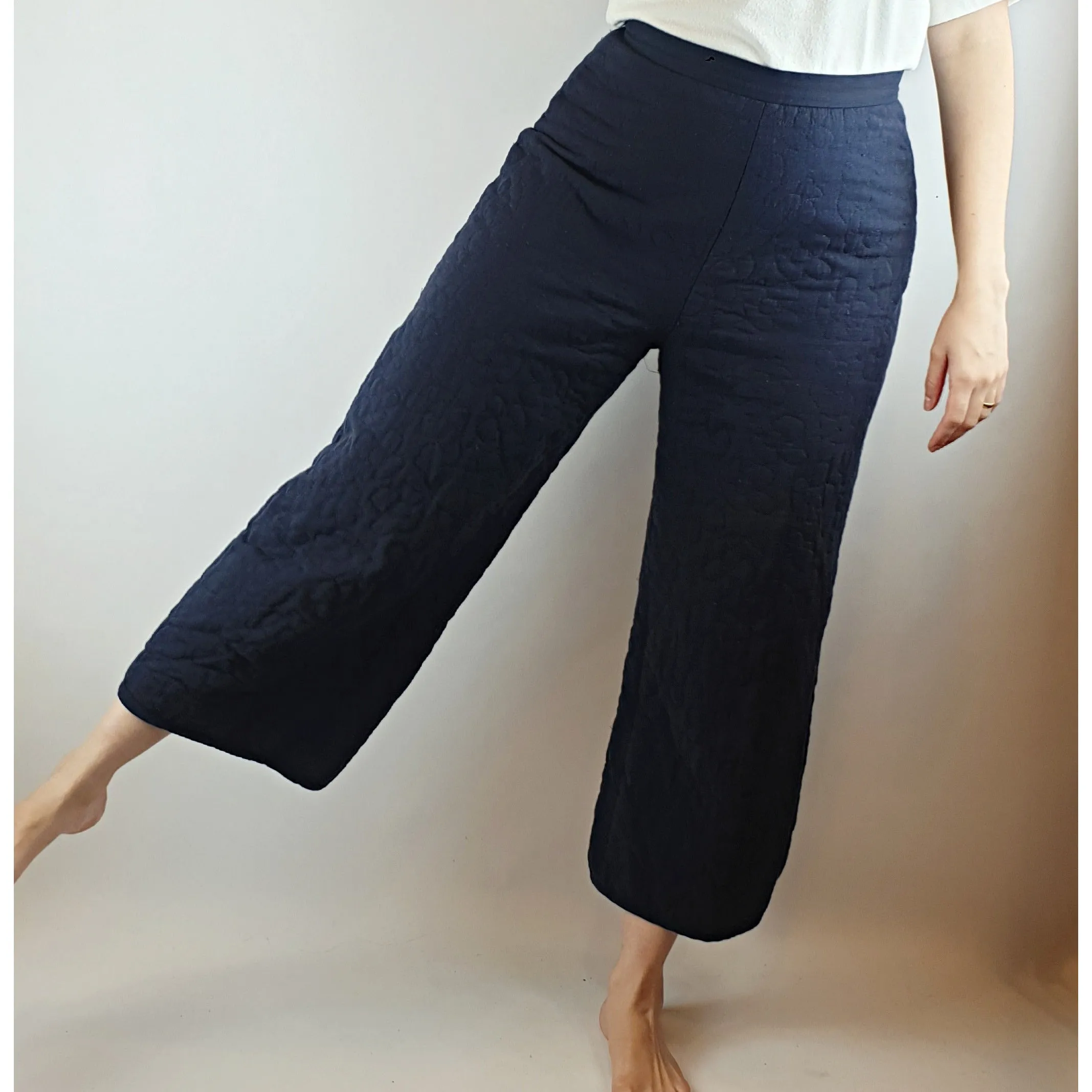 Alpha 60 pre-owned navy quilted wide leg pants with subtle flower stitching size S (best fits size 10)